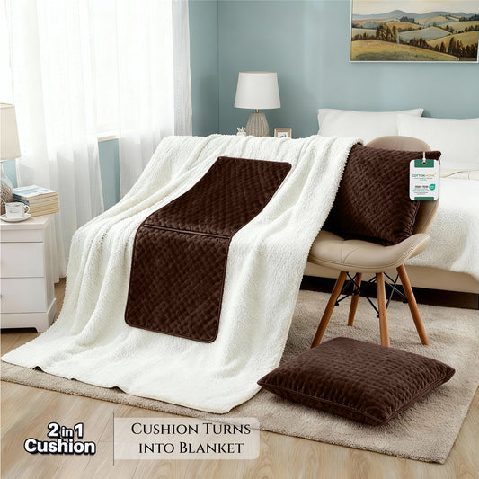 Brown cushion with blanket feature on a sofa in a living room setting