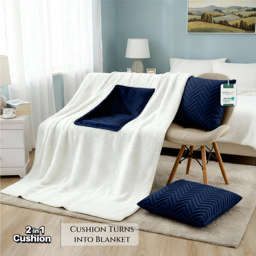 2 in 1 White blanket with a navy blue cushion in a bedroom setting