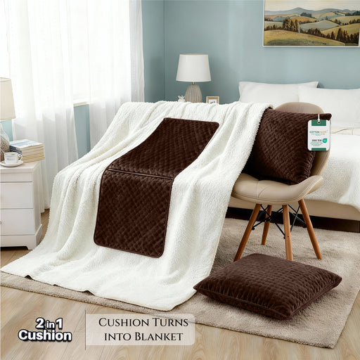 Brown cushion with blanket feature on a sofa in a living room setting